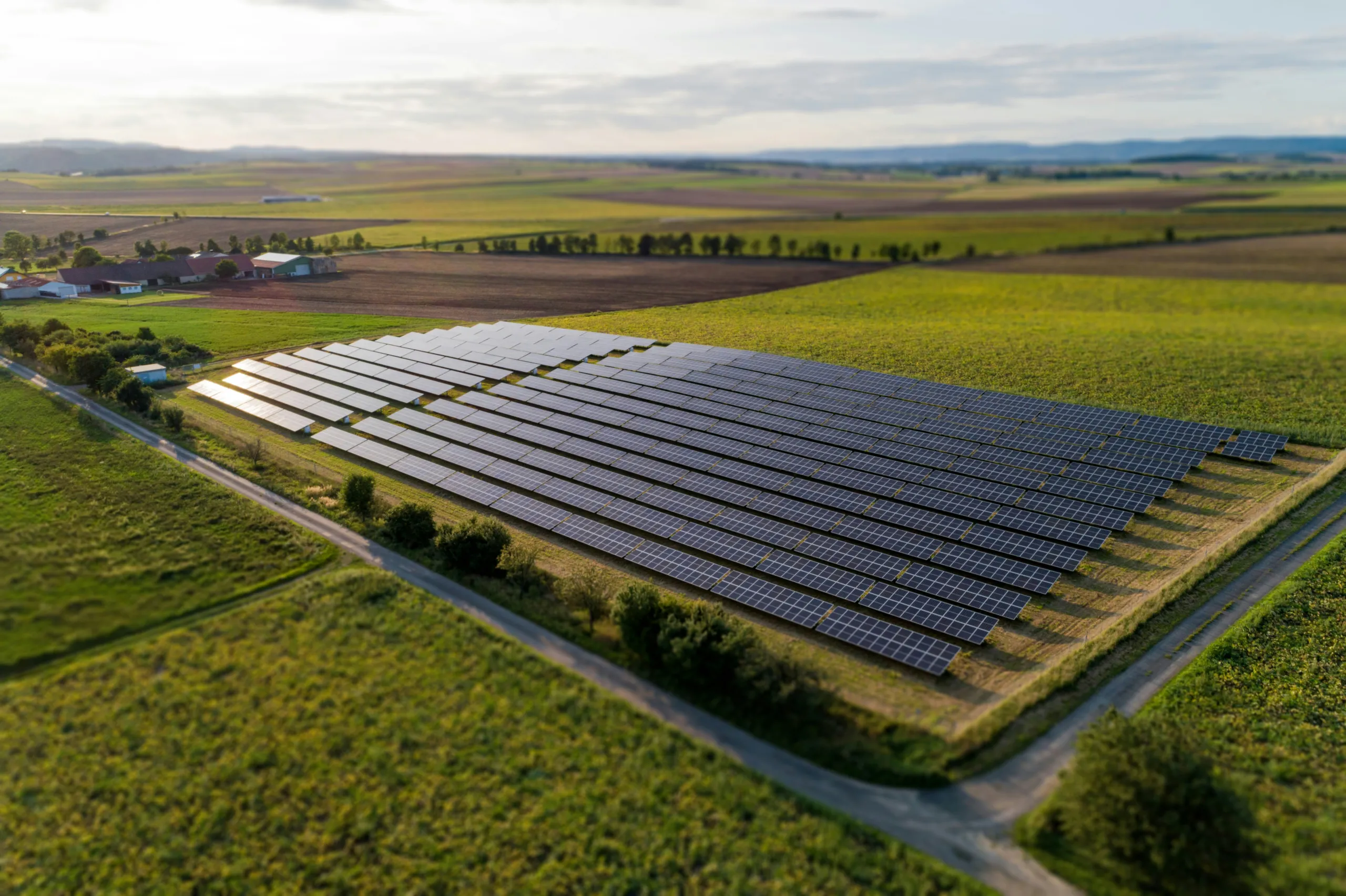 Aerial view of a ground-mounted solar photovoltaic farm — illustrating the scale of solar O&M operations that benefit from a CAPEX CMMS model CAPEX vs SaaS Solar CMMS: 10-Year TCO Comparison | Five... Compare CAPEX vs SaaS solar CMMS on 10-year TCO, NIS2 compliance, and Microsoft 365 architecture. Break-even at 14–18 months. Edit Snippet